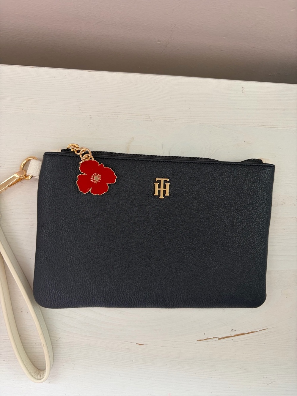 Tommy Hilfiger blue Wristlet Clutch with Red Flower Charm